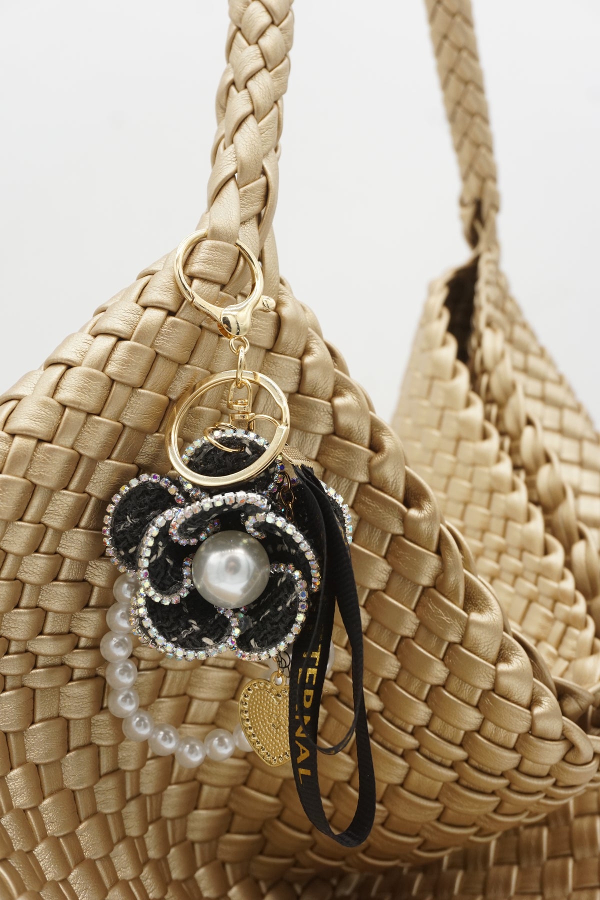Camellia pendant keychain for small bags and accessories with a