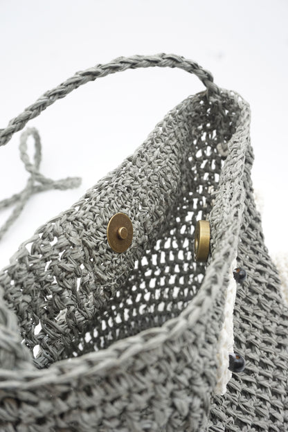 Paper Staring Pebble Crossbody Bag